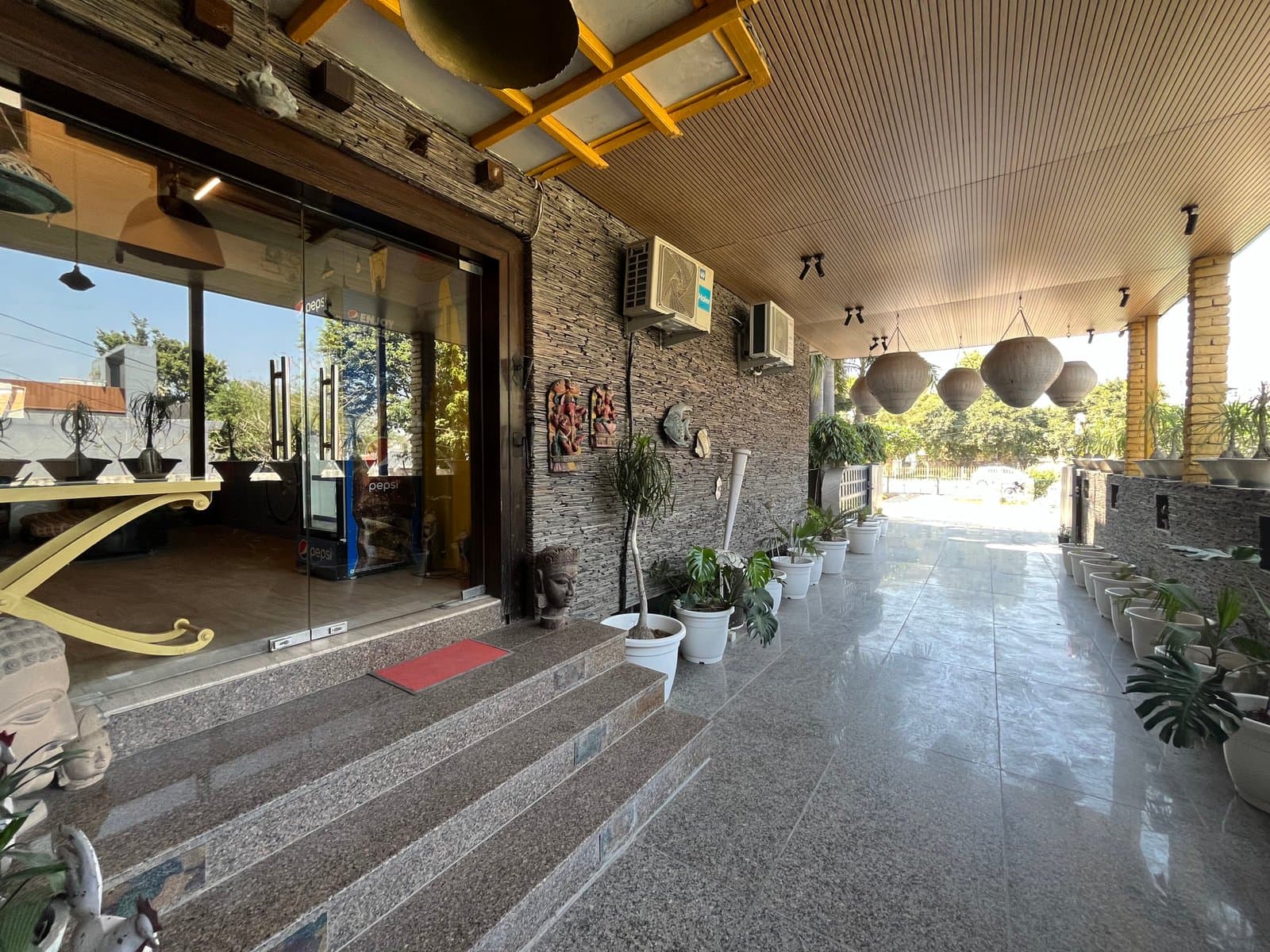 The driveway and arrival point at Aakriti Hotels