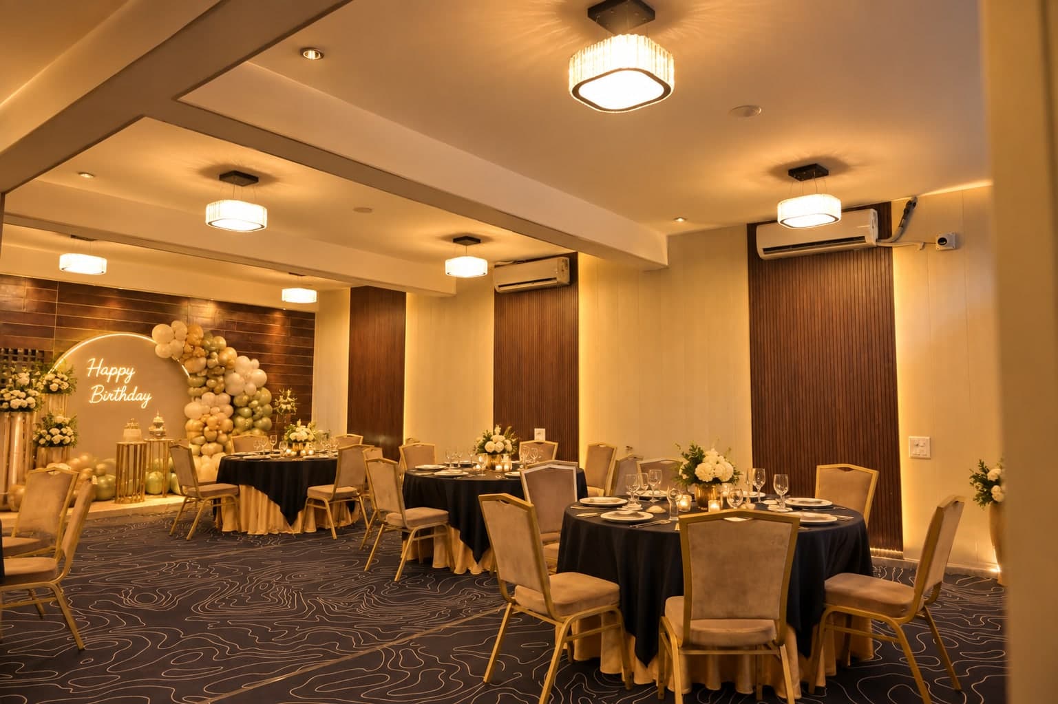 The indoor banquet hall at Aakriti Hotels set for a birthday, Gurugram