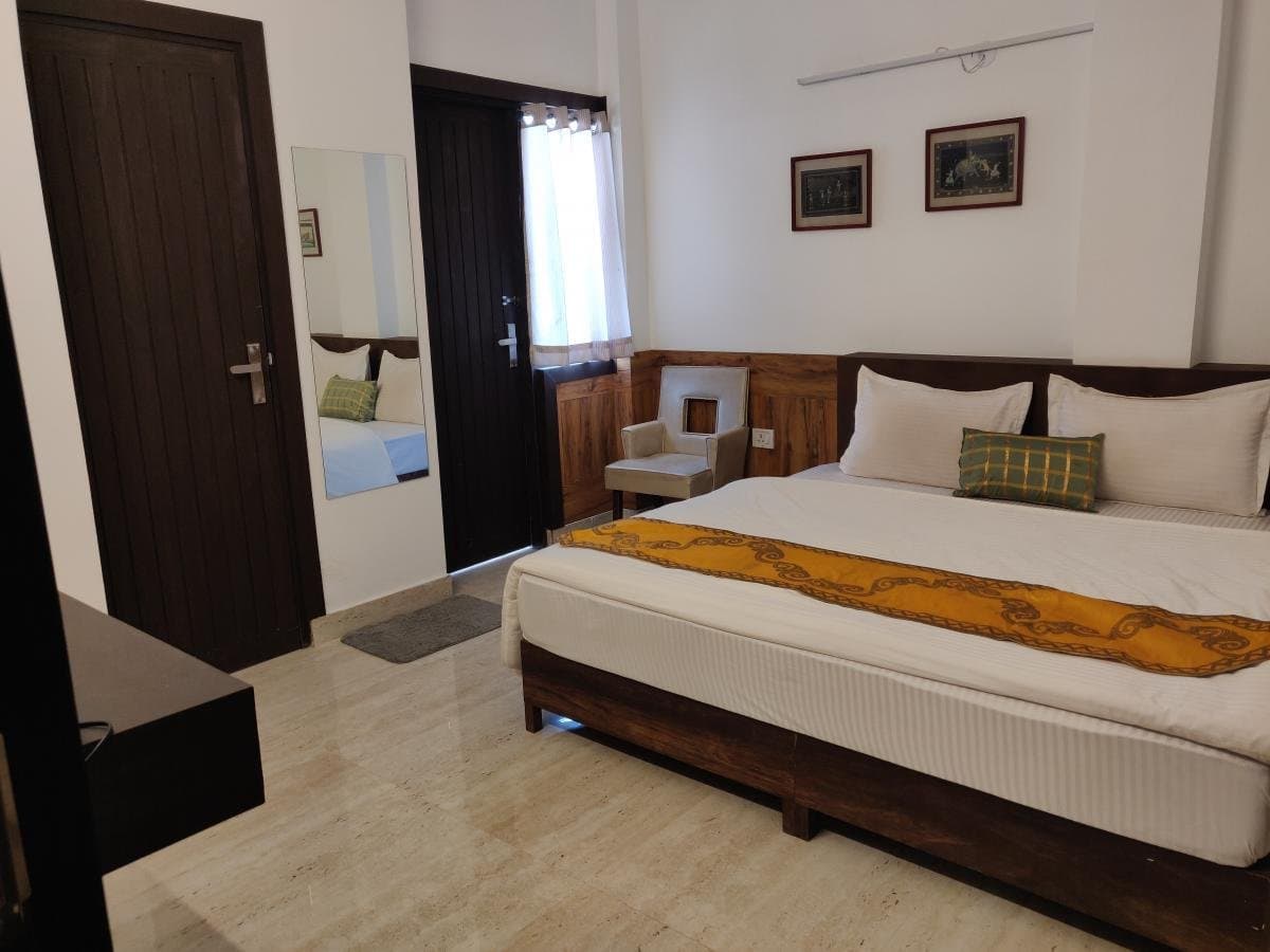 Balcony Deluxe Room interior at Aakriti Hotels