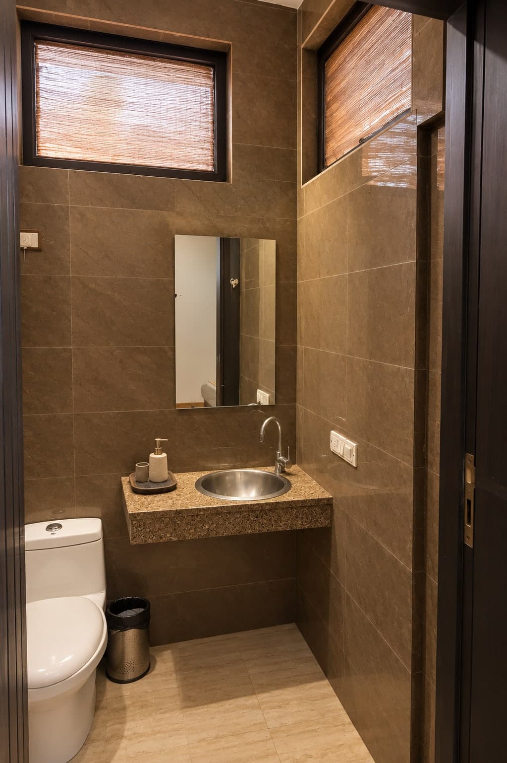 A marble bathroom at Aakriti Hotels, Sector 23 Gurugram