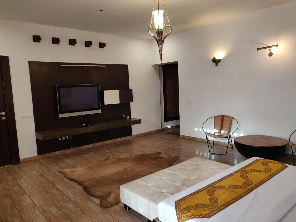 The Presidential Suite living area at Aakriti Hotels
