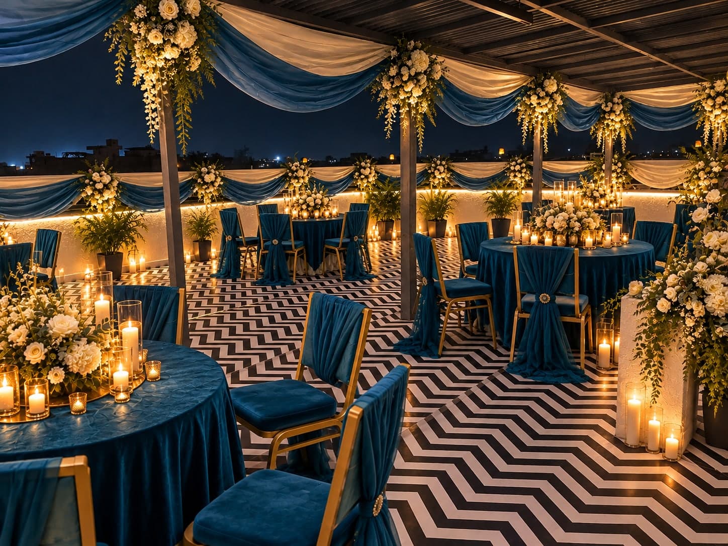 Candlelit rooftop dinner setting at Aakriti Hotels
